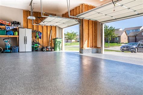 Hello garage - Hello Garage Polyaspartic floor coating bonds to the concrete, leaving you with a beautiful, durable floor for years to come. Flooring: Taupe. Easy to Clean Floors. Before After. With outdoor elements like dirt, sand and salt being brought in to your garage every time the door goes up, your concrete can be impossible to keep clean.